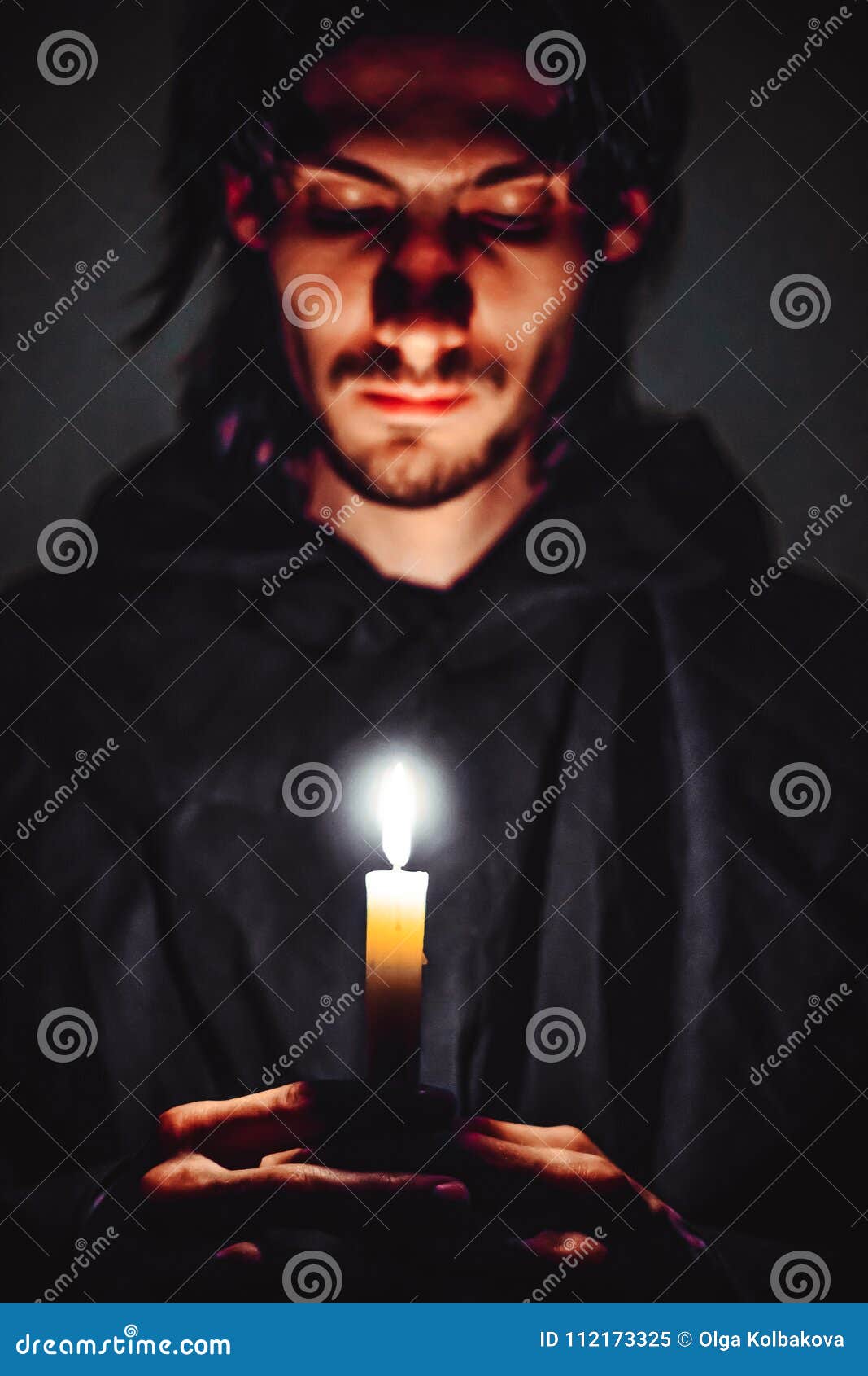 A monk with a candle stock image. Image of death, faith 112173325
