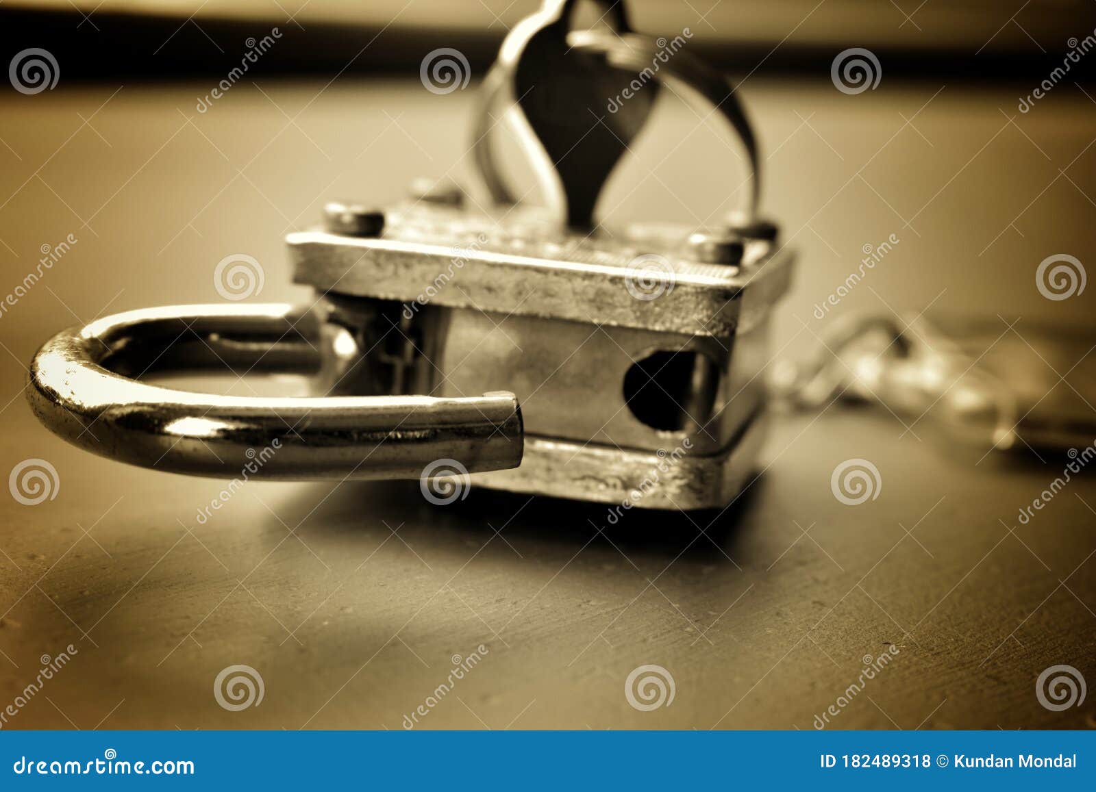 Monochrome Image of an Unlocked Lock with Key Stock Photo Image of