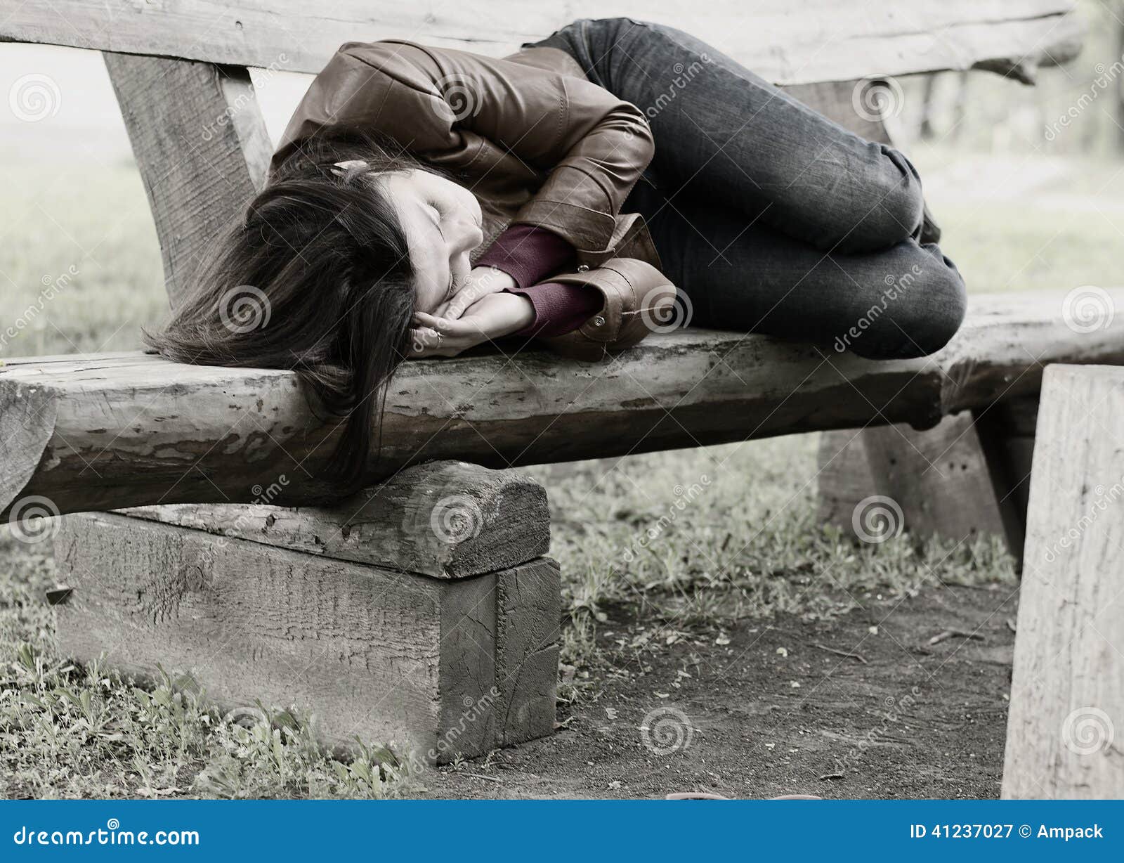 Monochrome Image Of A Woman On A Park Bench Stock Photo 