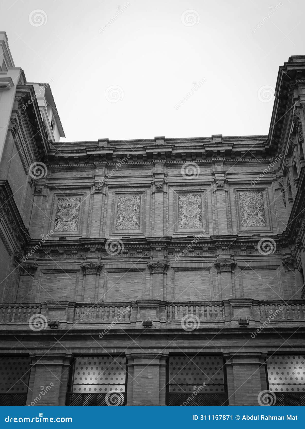 monochrome portrait of edificio coliseo in seville