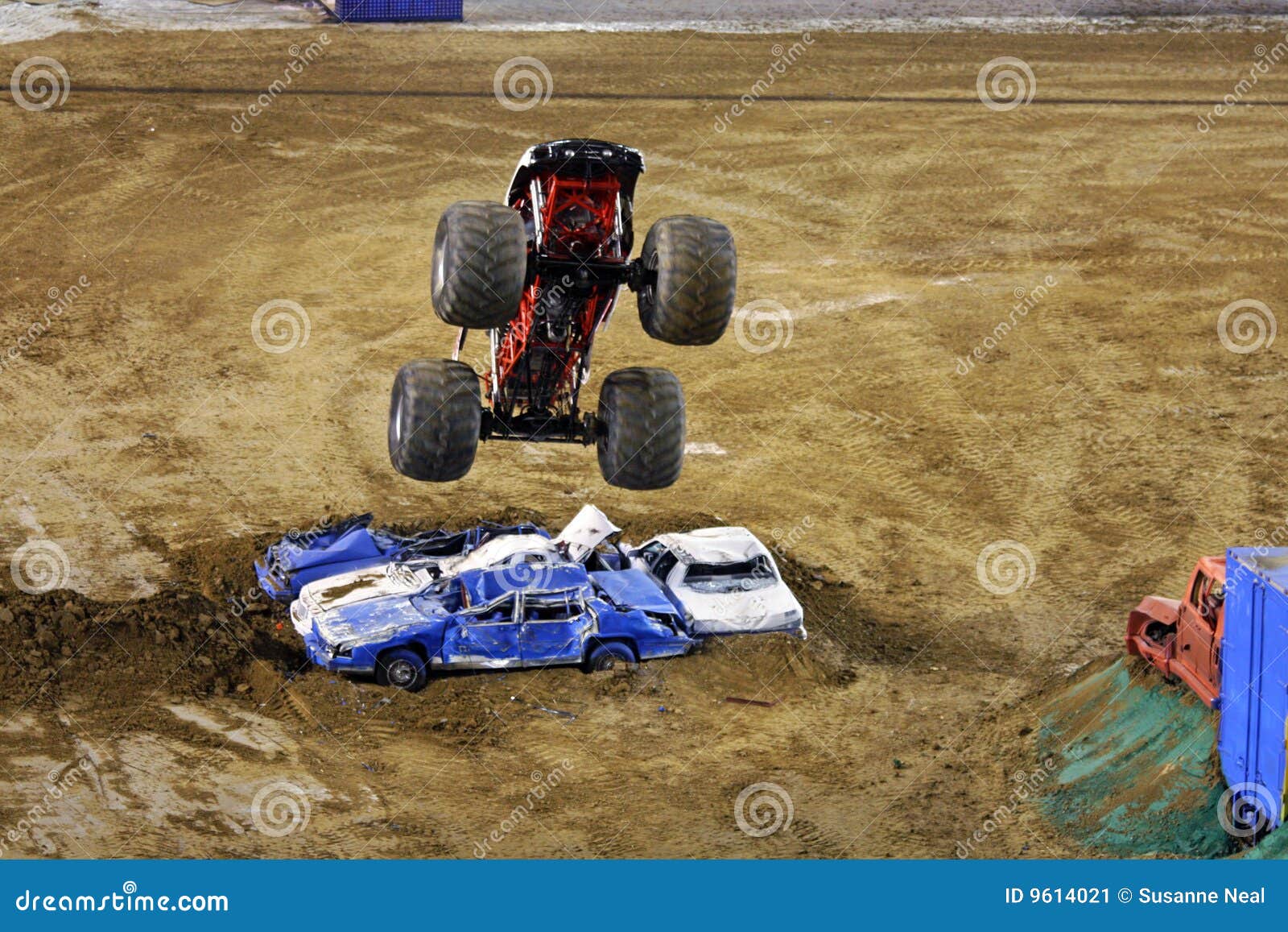 Download A Cartoon Image Of A Monster Truck Flying Through The Air