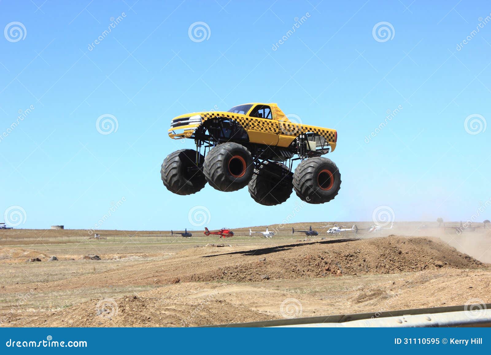 Download A Cartoon Image Of A Monster Truck Flying Through The Air