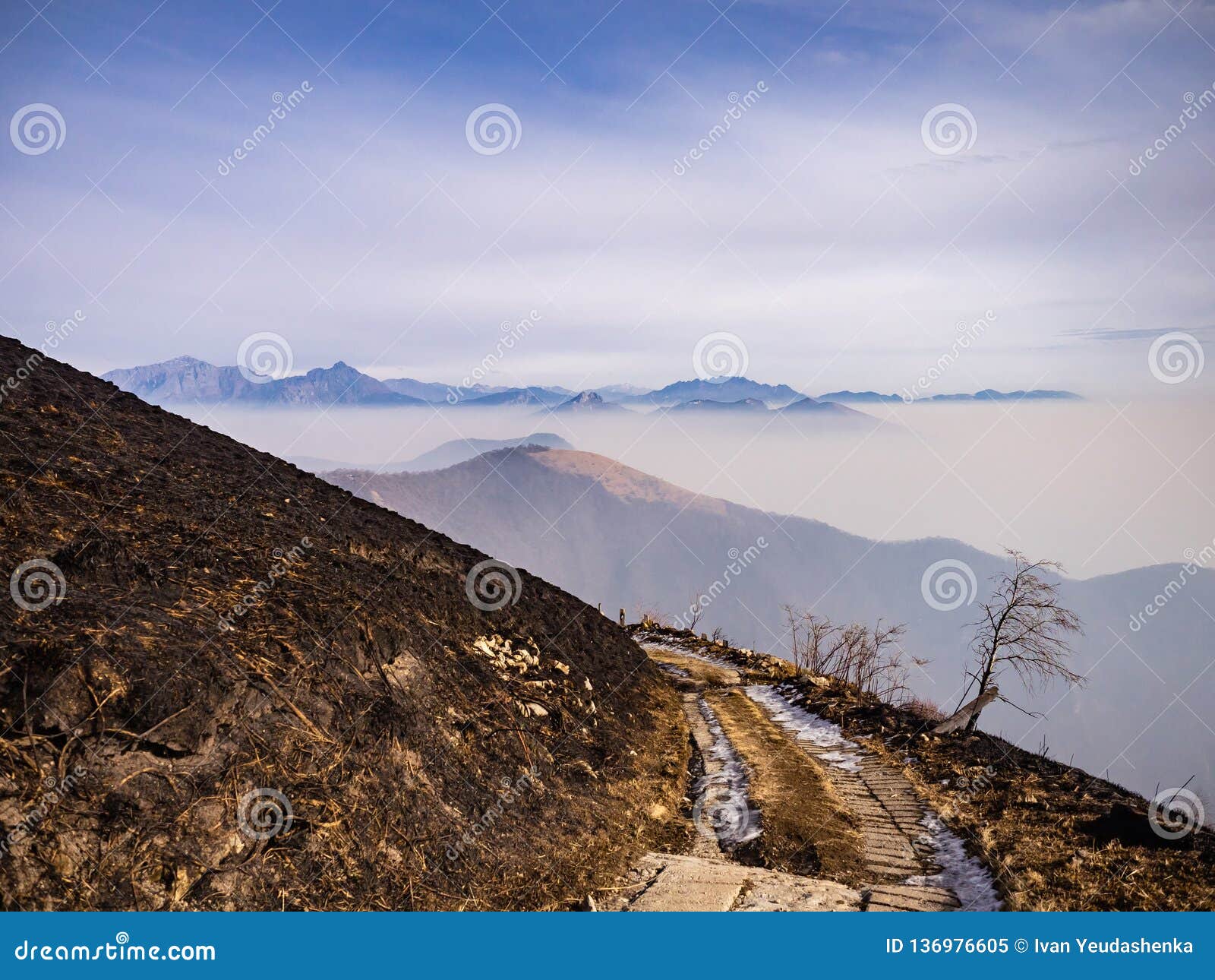 monte resegone as viewed from burnt slopes of monte bolettone