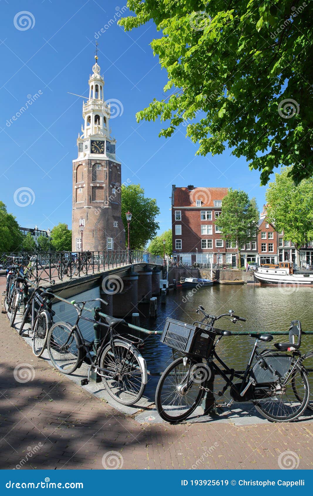montelbaanstoren tower built in 1516, located along oudeshans canal in amsterdam centrum