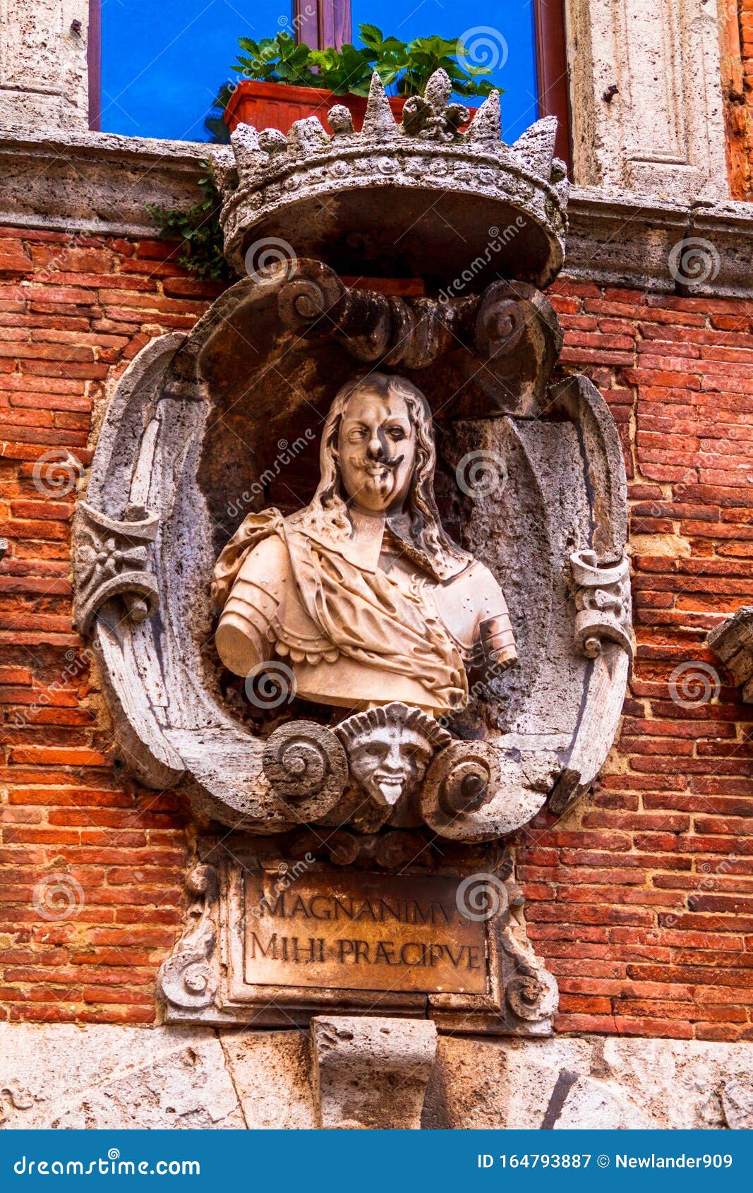 sculpture on the facade of the building in montepulciano, siena, italia