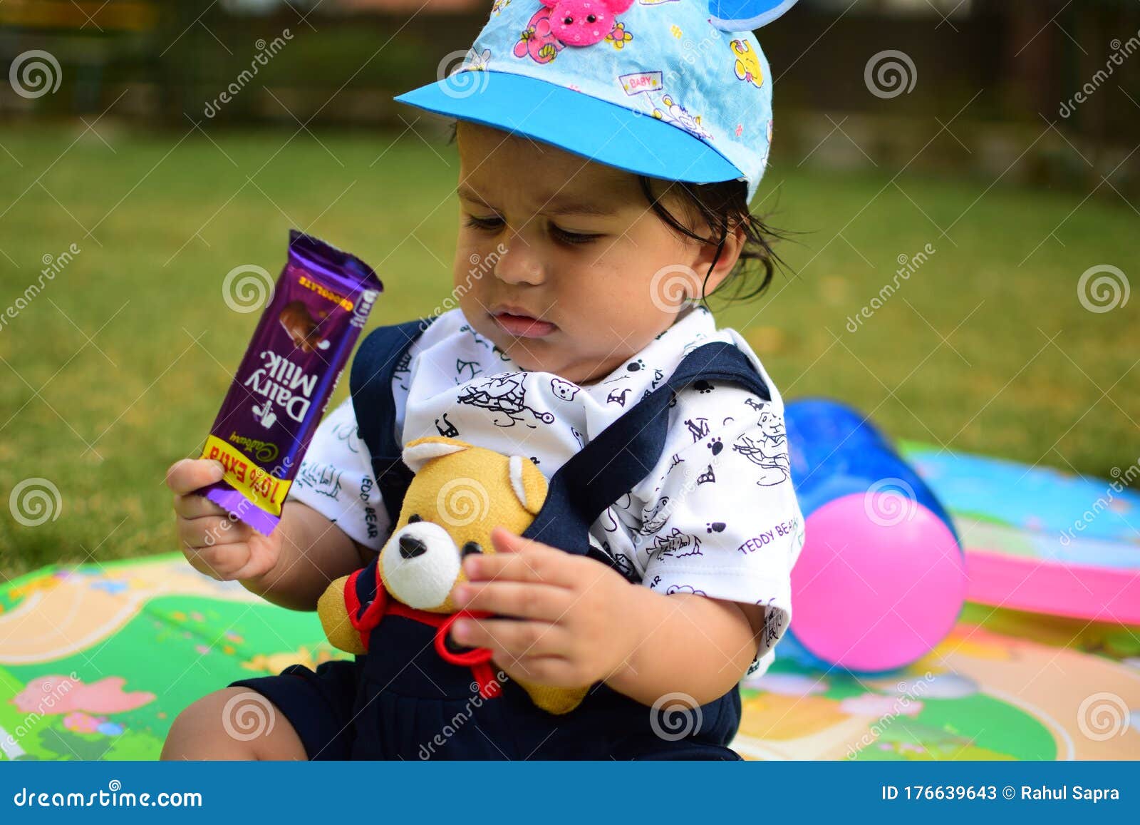 9 Month Baby Boy Outdoors In Summer - Stock Photo, Cute Boy Playing In The  Park, Sweet Little Baby Boy Enjoying Editorial Stock Photo - Image Of Park,  Outdoors: 176639643