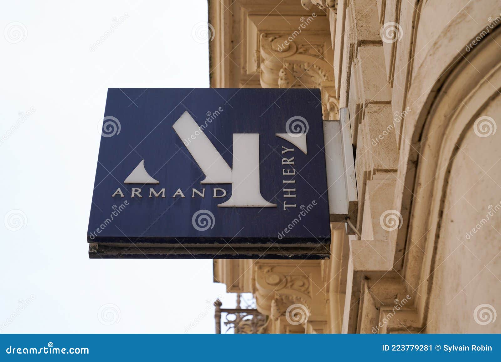 Armand Thierry Logo Brand and Text Sign on Fashion Boys Men Store ...
