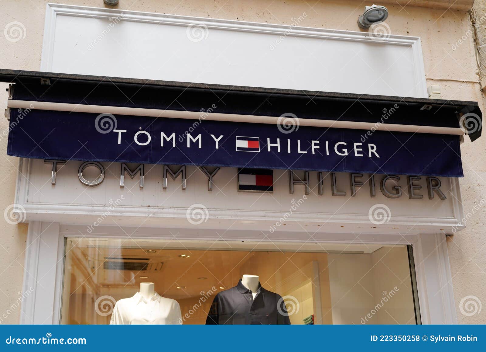 Tommy Hilfiger Sign Brand and Text Logo Store Front of American ...