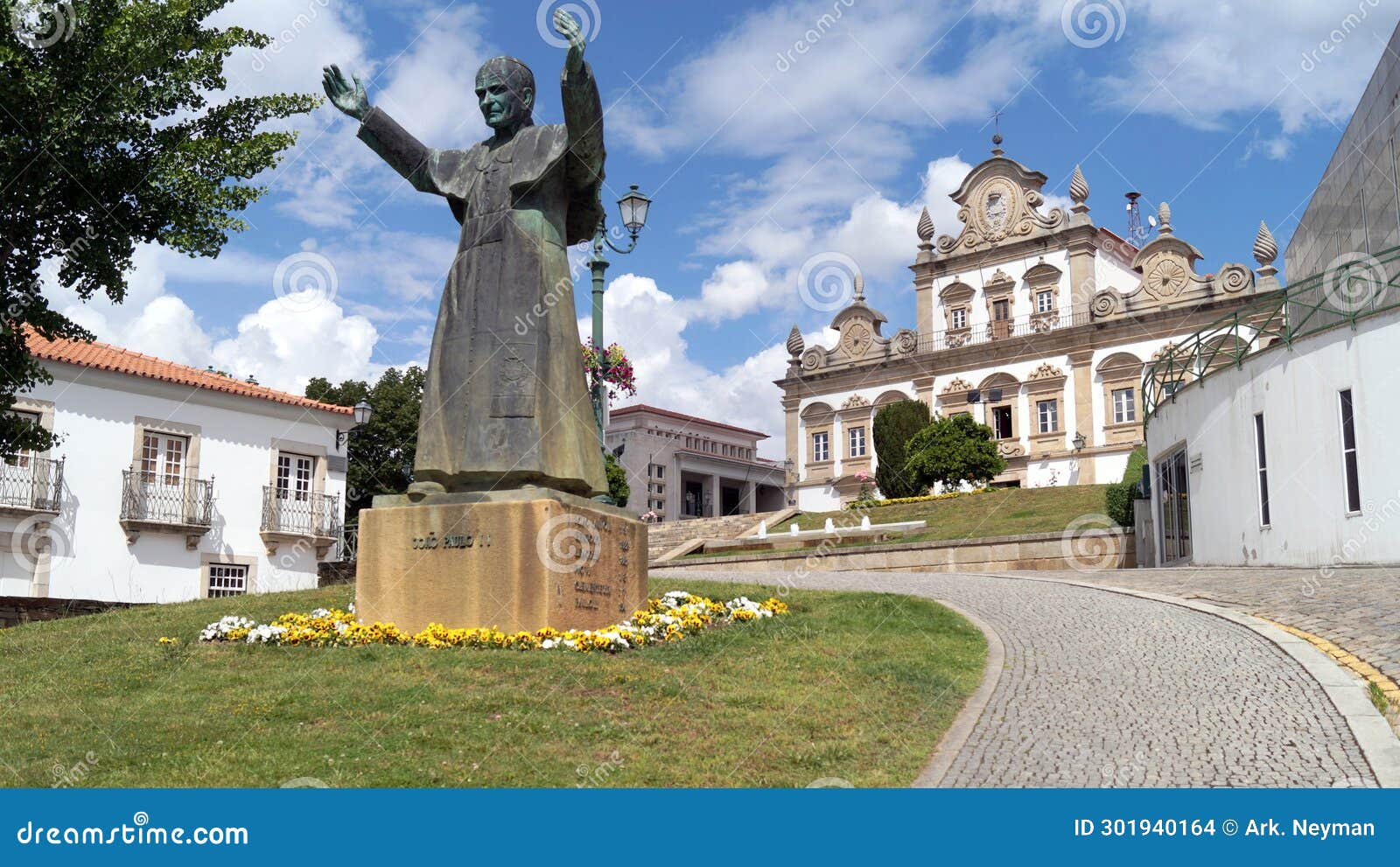 monument to john paul ii, paco dos tavoras in the background, mirandela, portugal