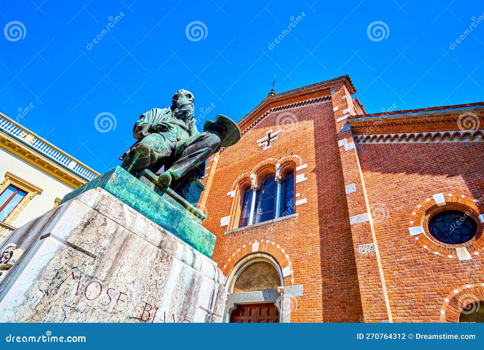 the monument to mose bianchi at the facade of chiesa di san pietro martire church in monza, italy