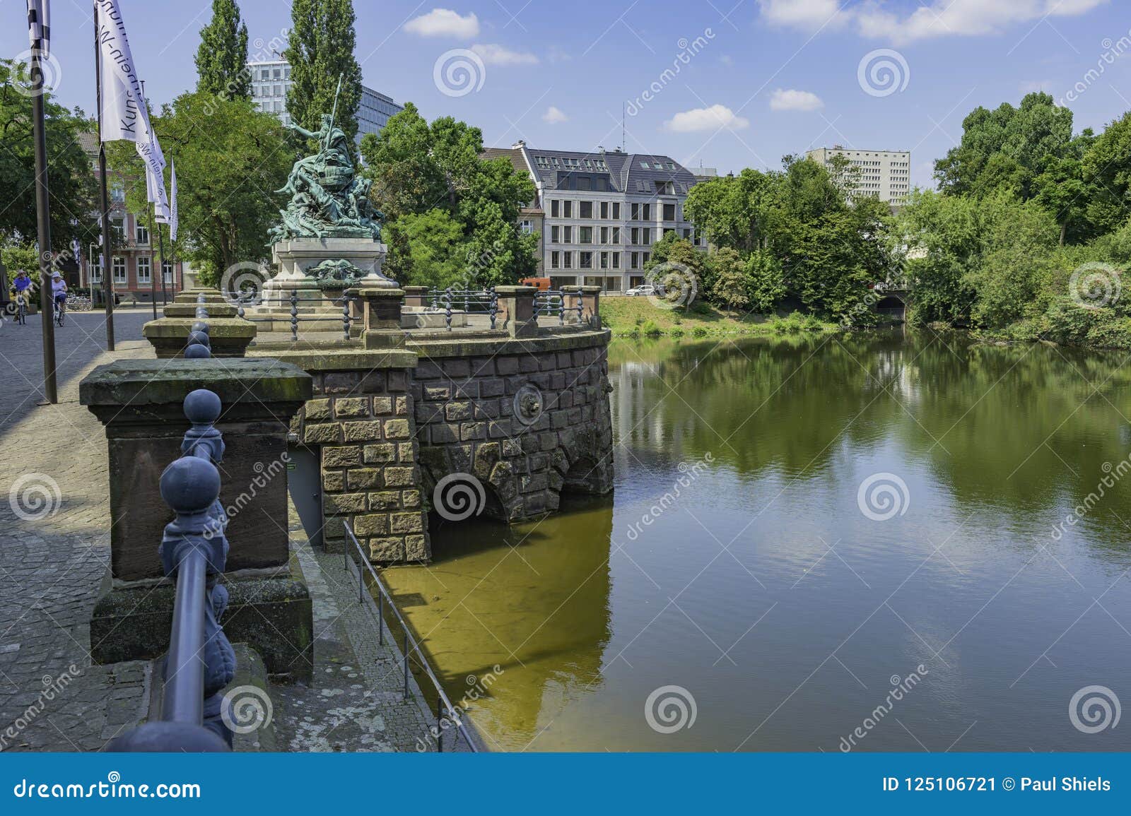 the monument of vater rhein und seine tÃÂ¶chter and the lake kaiserteich in stÃÂ¤ndehauspark, dusseldorf, germany.