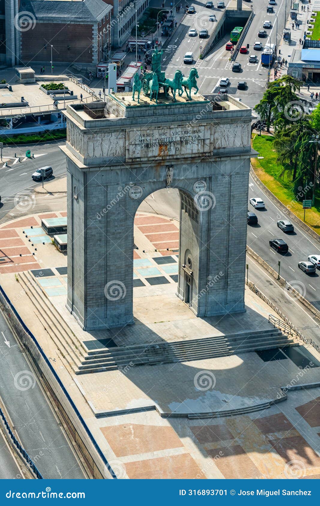 monumental arch of the moncloa, north entrance to the city of madrid, spain.