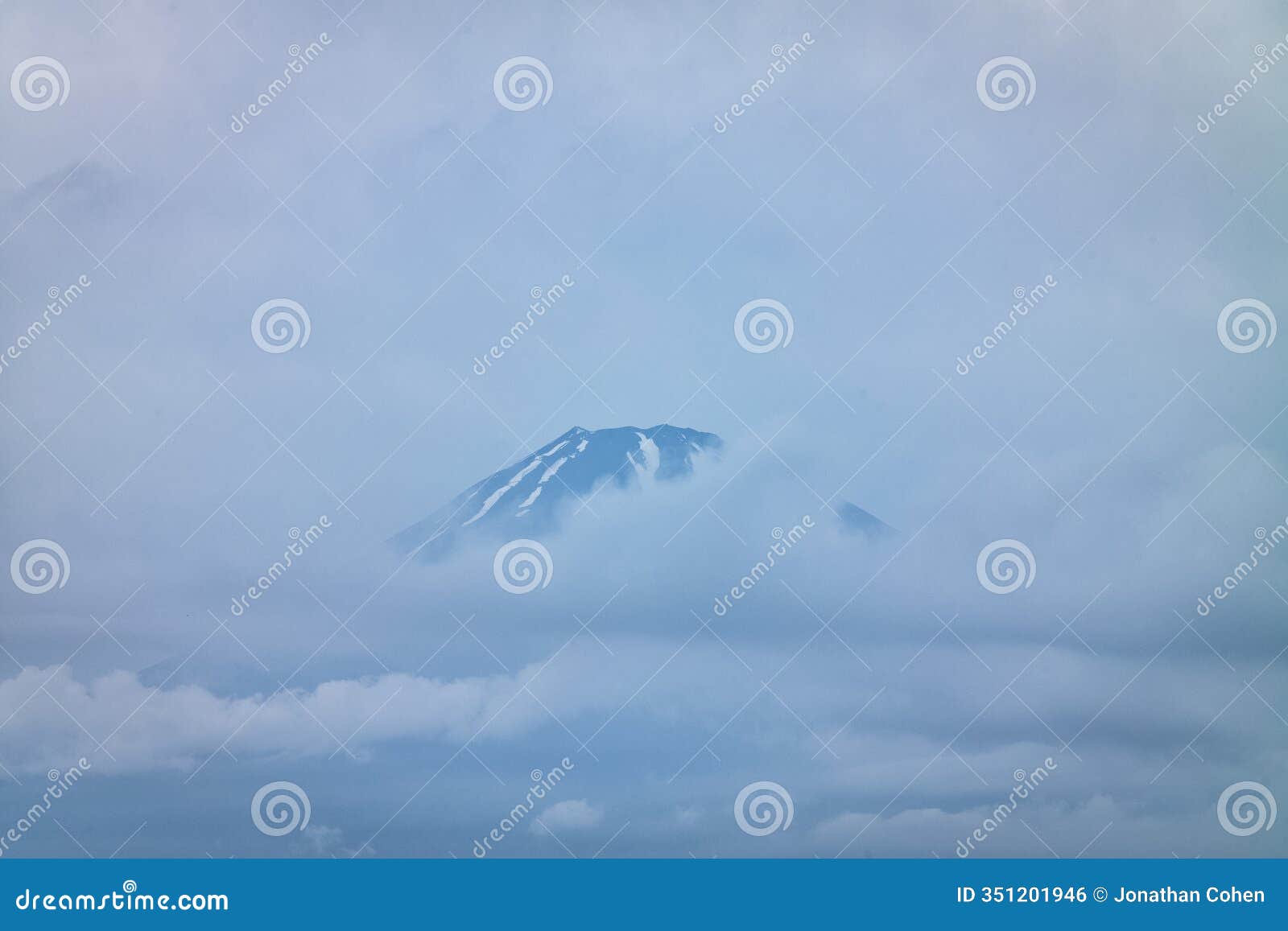 moody image of mount fuji, japn during a cloudy day