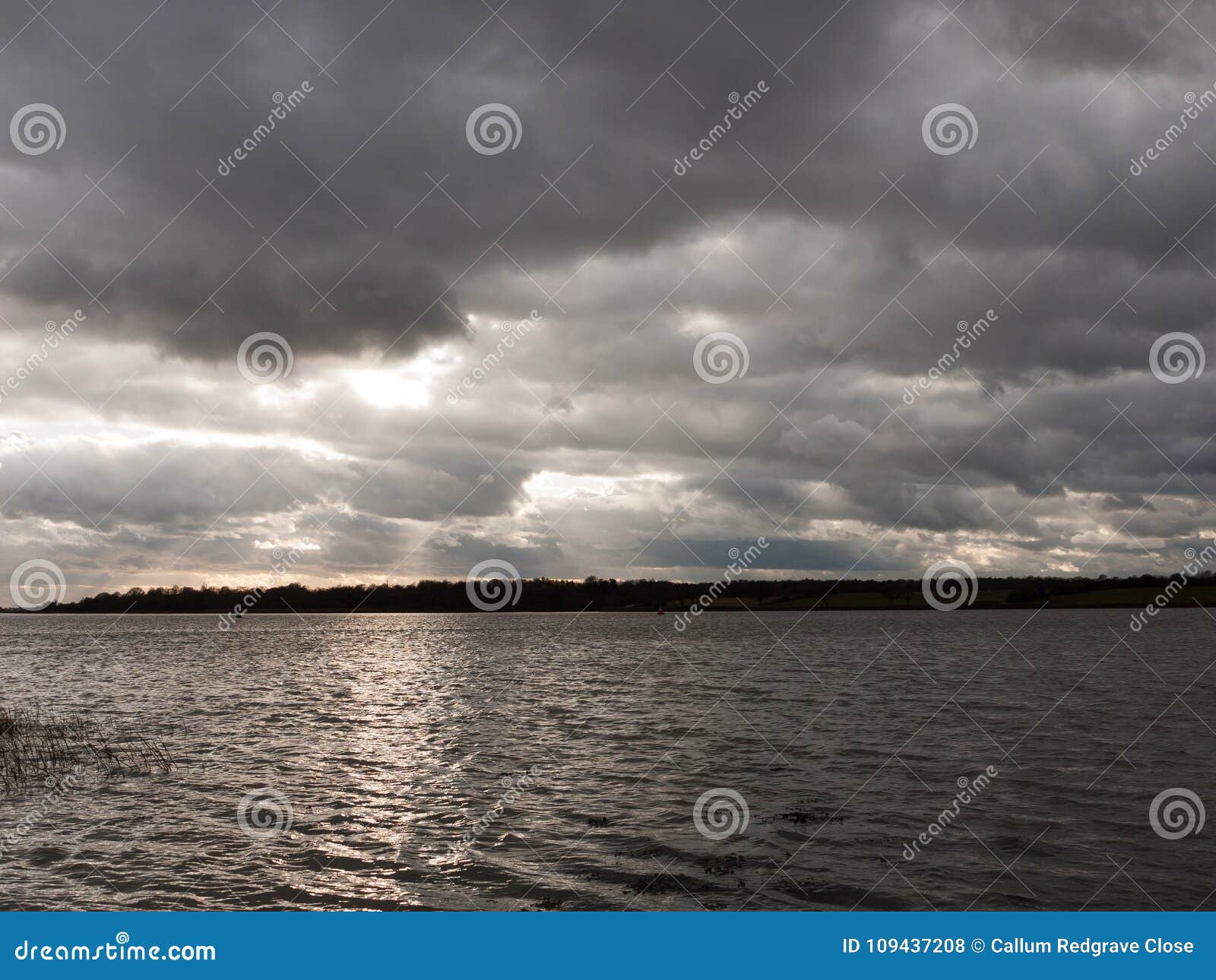 moody sky clouds autumn winter grey dark bay ocean river estuary