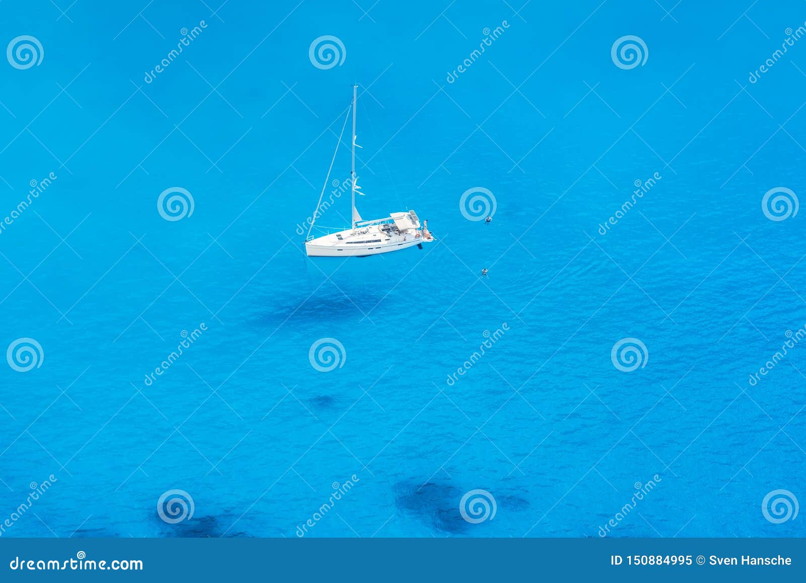 a sailing boat over the blue sea of the ionian islands in greece, zakynthos