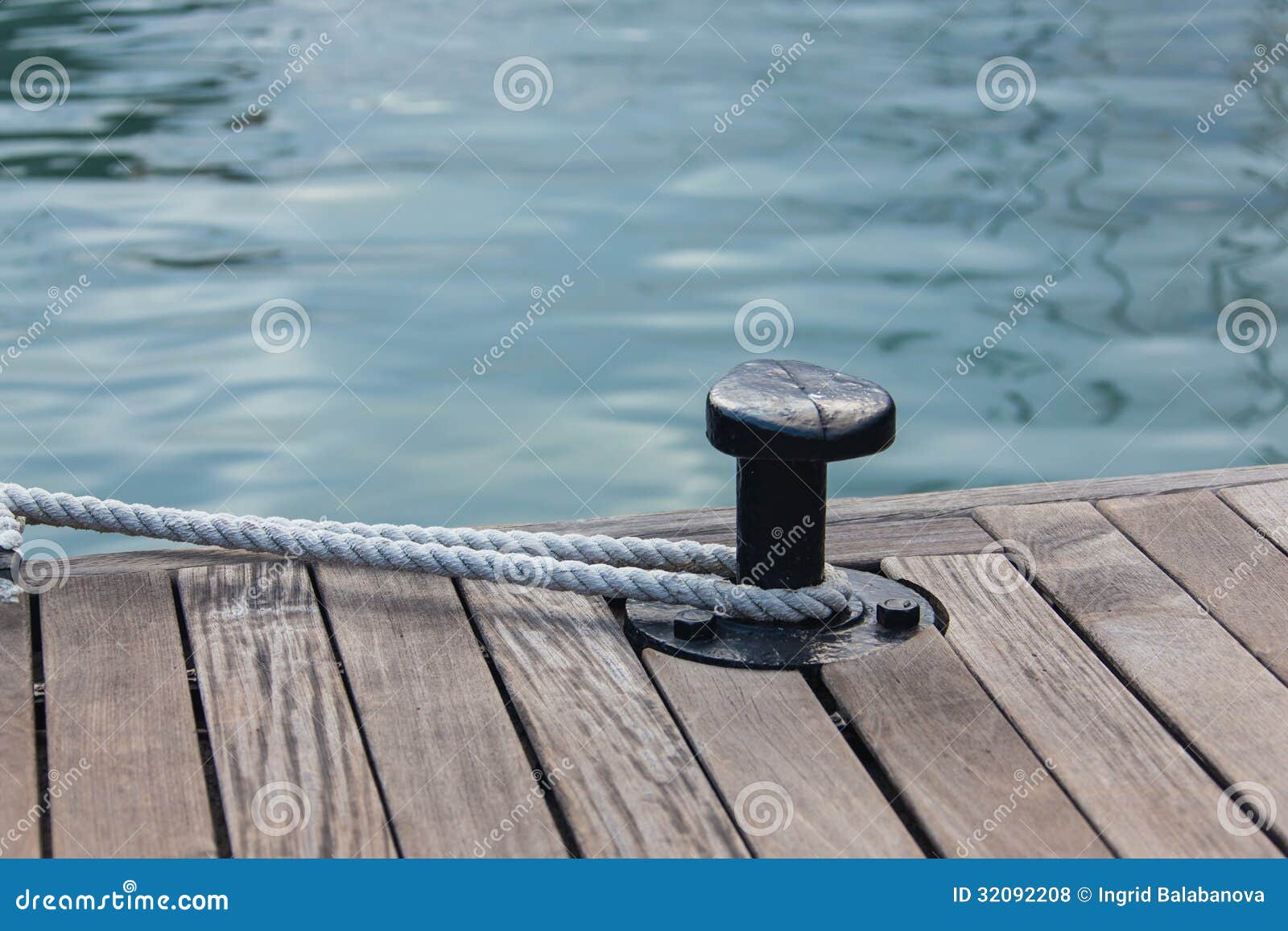 mooring rope tied around steel anchor
