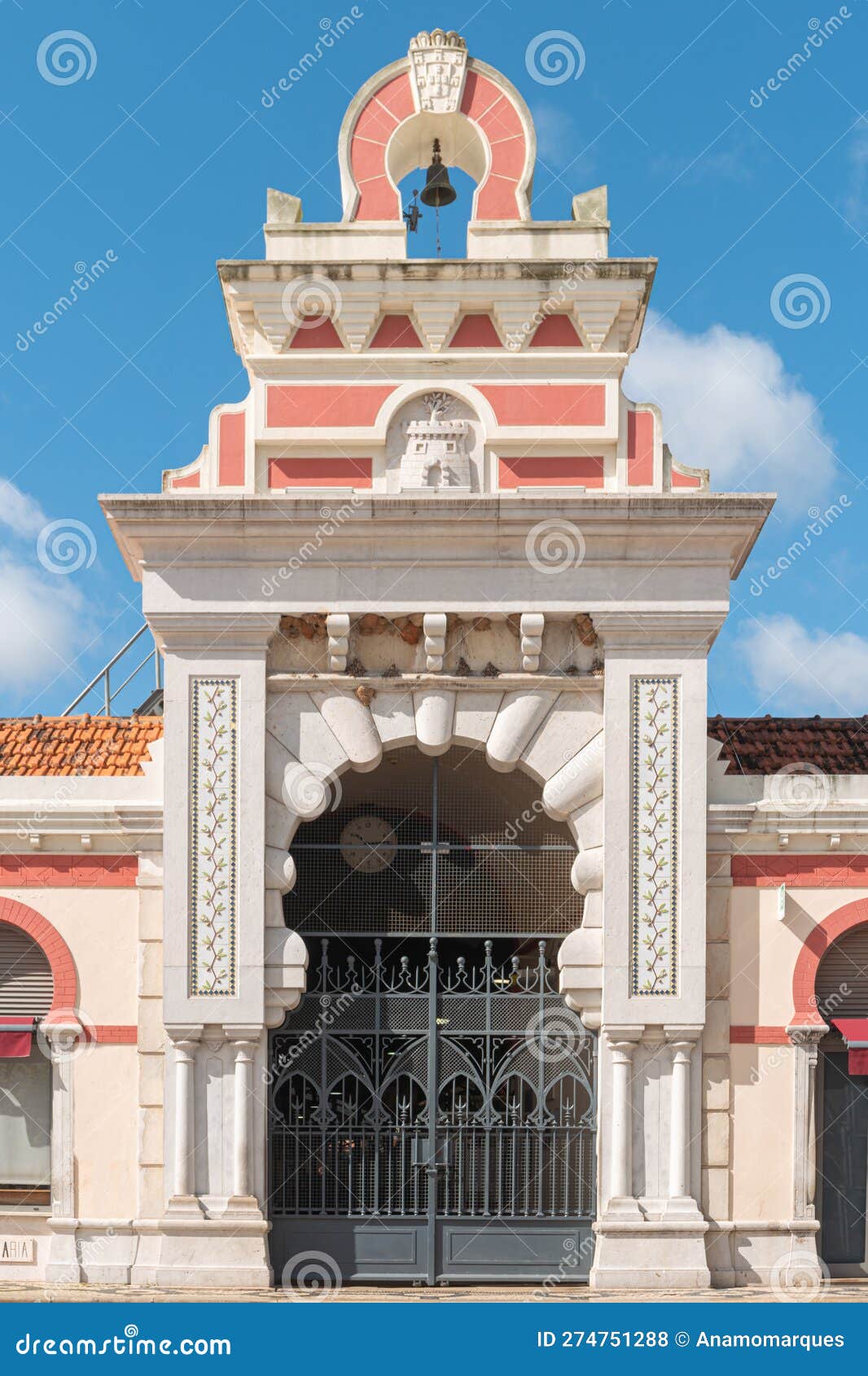 moorish architectural facade of the traditional market. the markethall in the old town of loule. algarve, portugal.