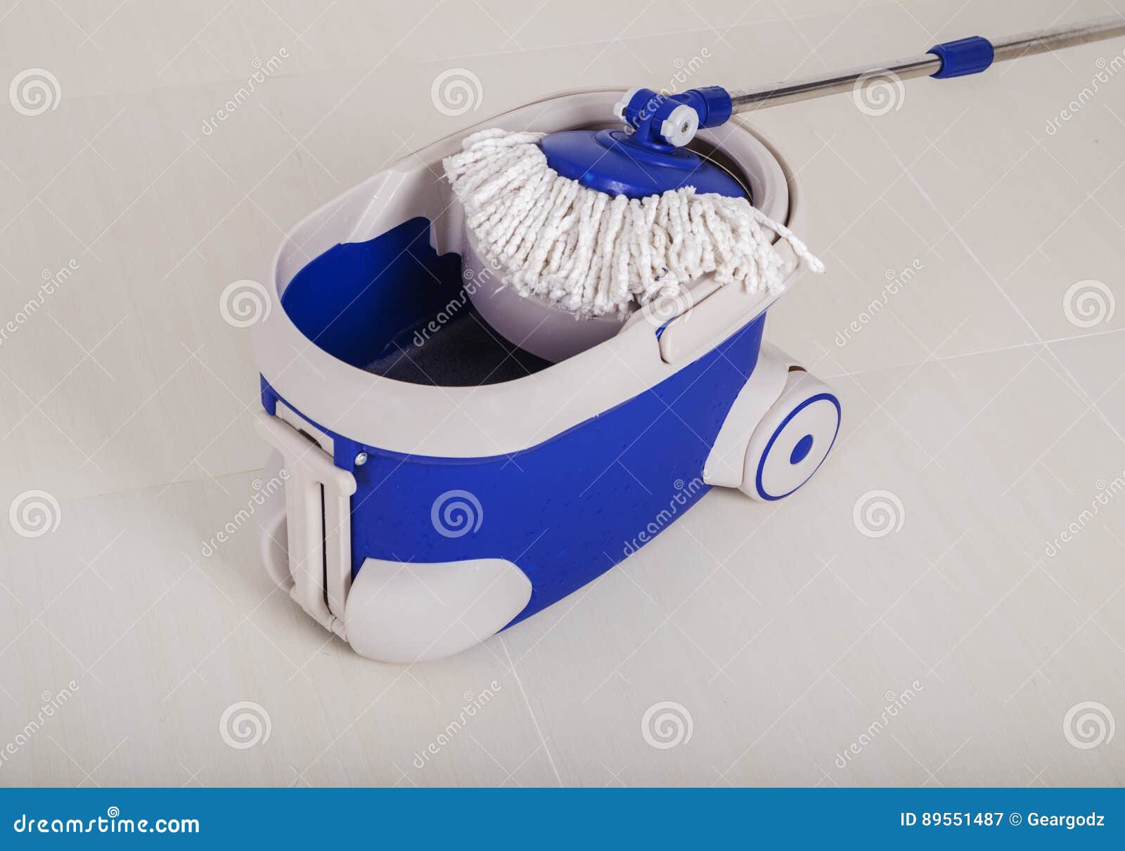 Mop and Blue Bucket for Cleaning Floor Stock Image Image of household