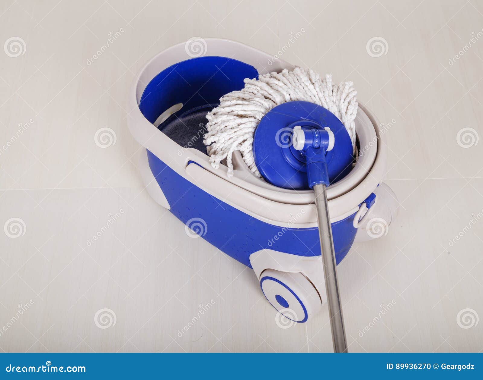 Mop and Blue Bucket for Cleaning Floor Stock Photo Image of equipment