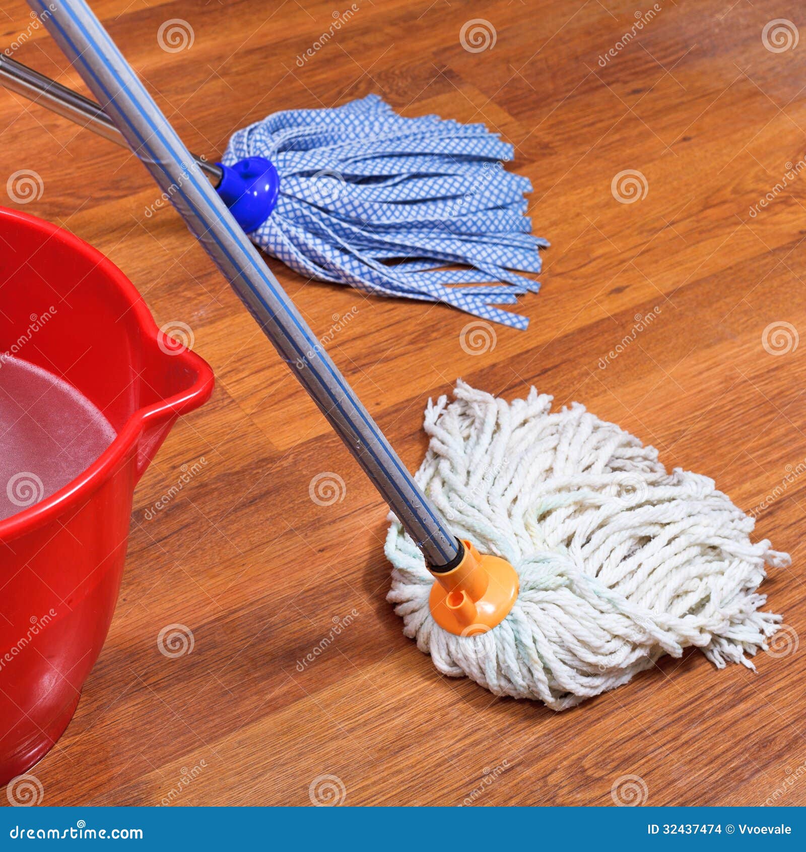 Mopping Of Wood Floors By Two Mops Stock Photo - Image ...