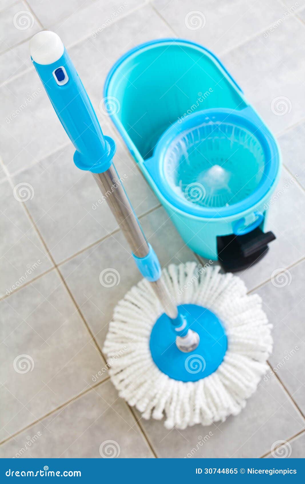 Mops and buckets of water. stock image. Image of green 30744865
