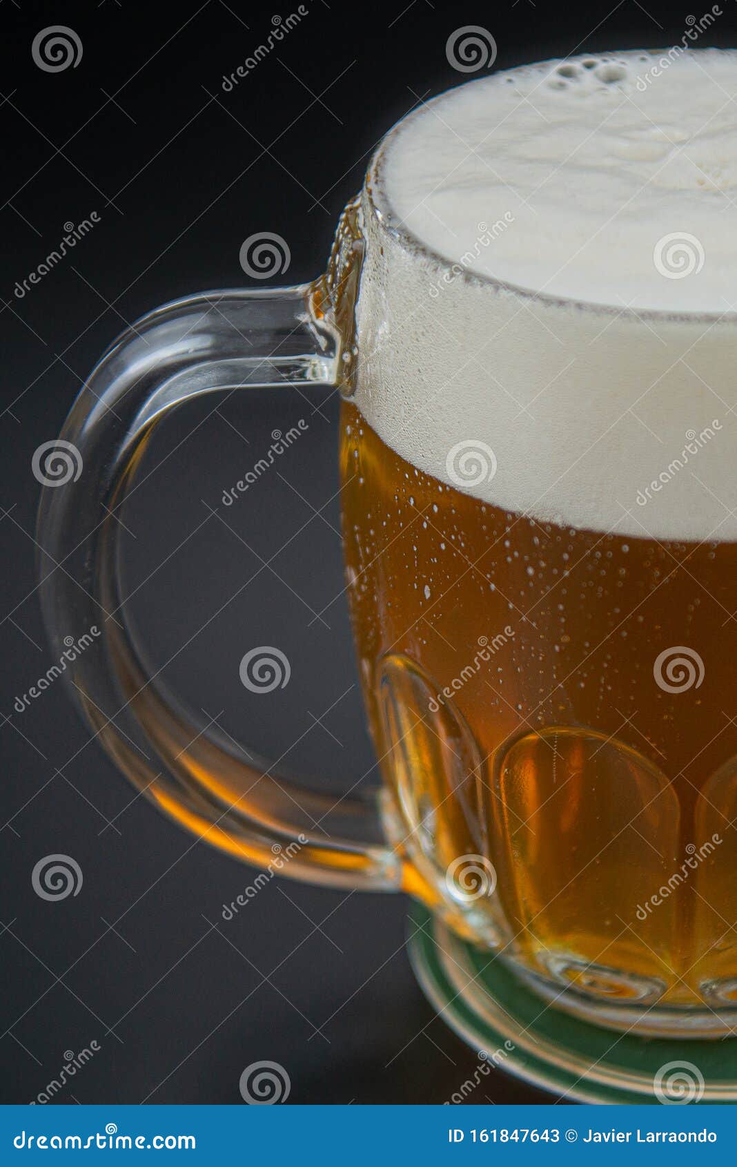 COLD BEER JAR with a LOT of FOAM CUTED by HALF Stock Image Image of