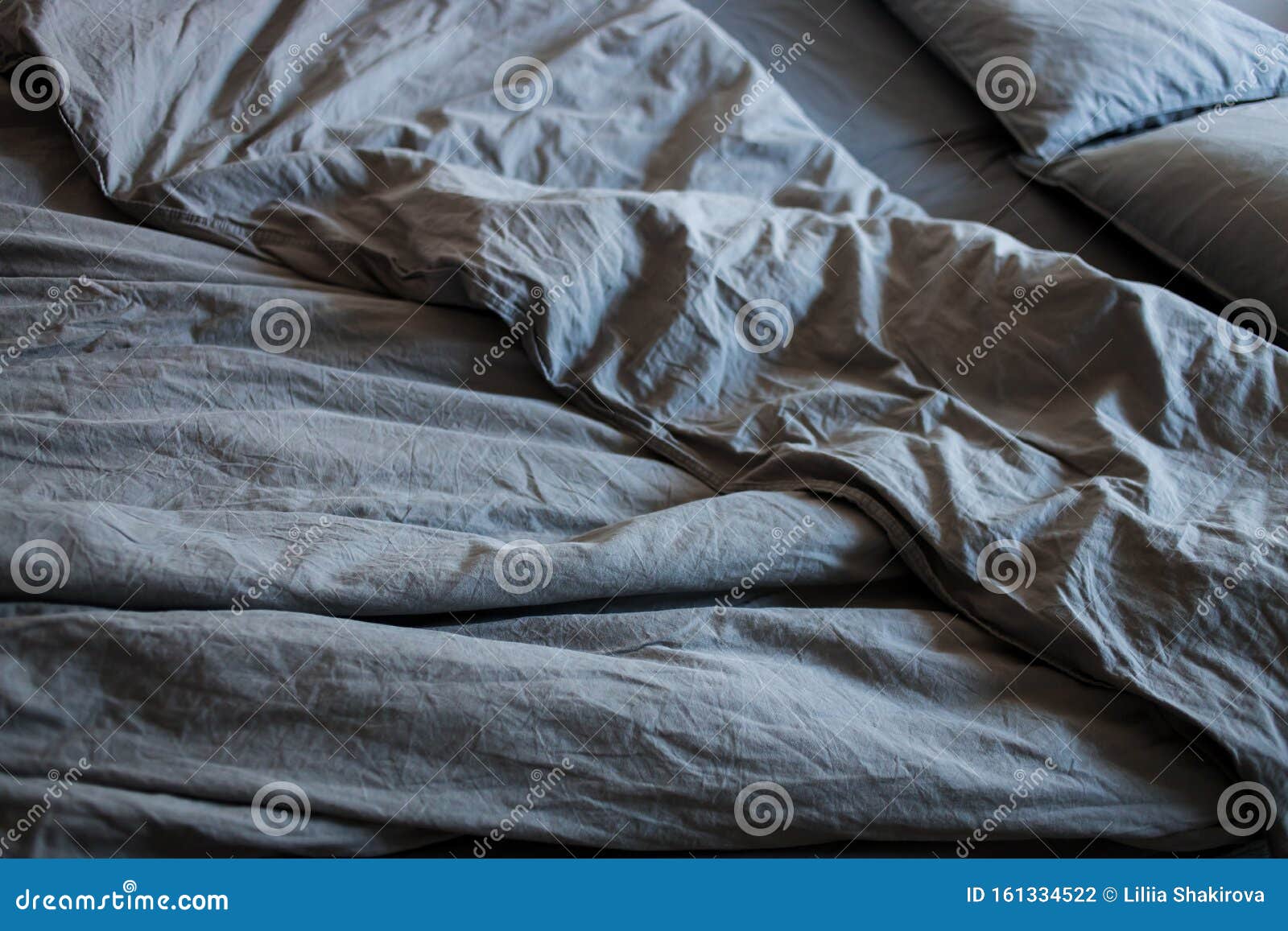 Blue Bed Sheets And Pillows After Night`s Sleep Stock Photo - Image of Blue Stains On Pillow After Sleeping