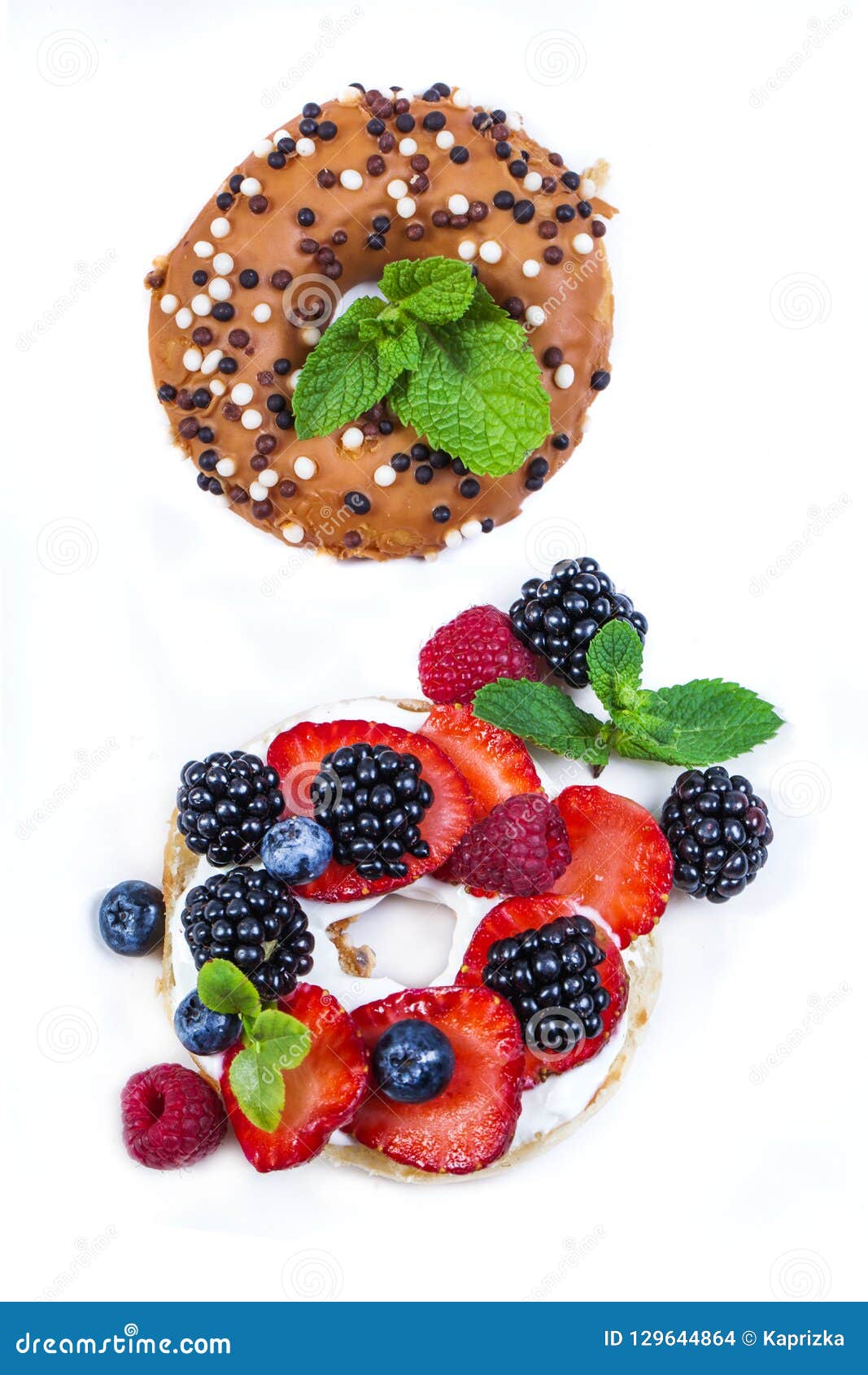 morning breakfast with mini donuts and berries on plate under po