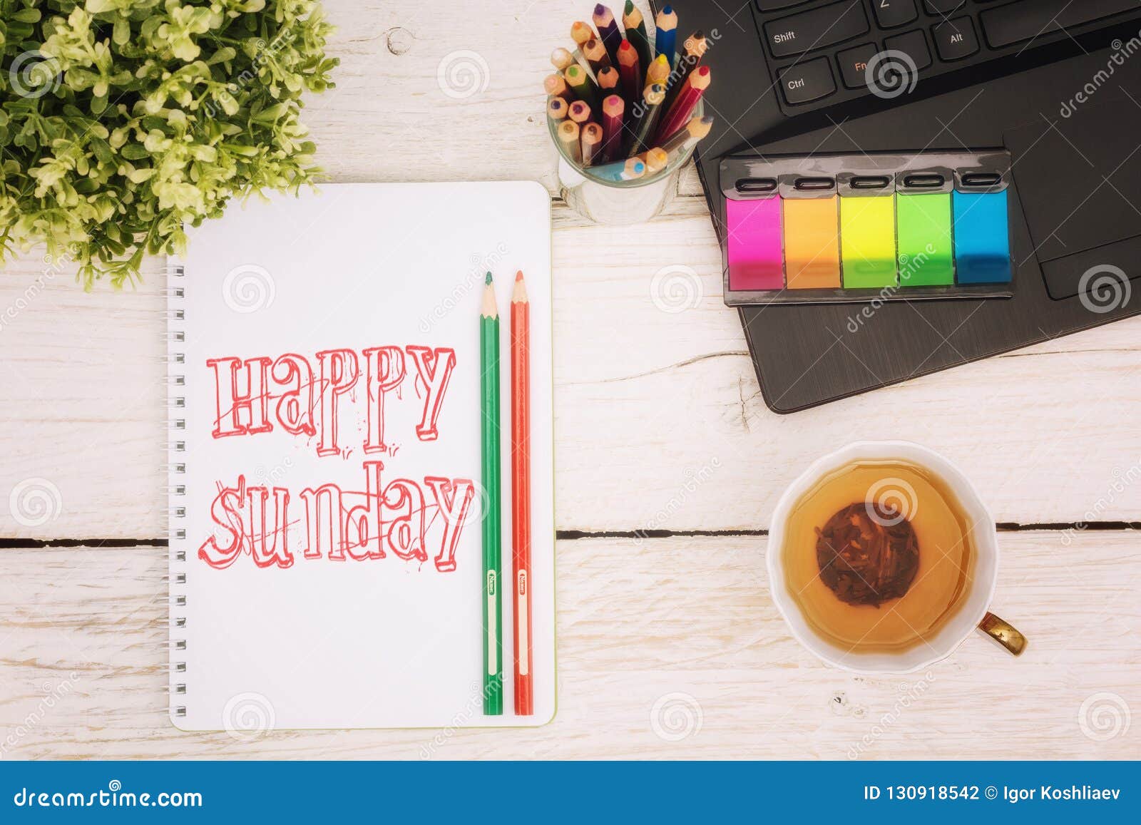 Morning cup of tea at work stock photo. Image of electronic 130918542