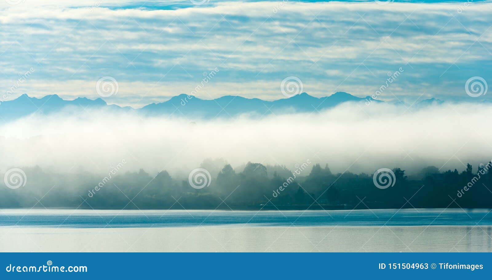 morning fog over puerto varas on the shores of lake llanquihue, chile