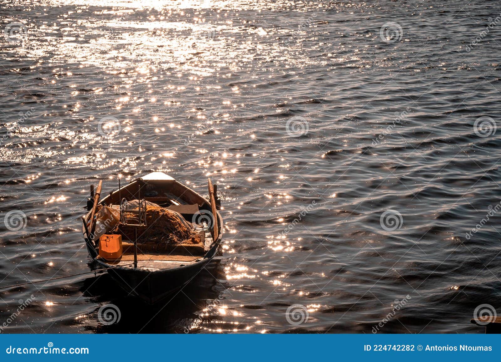 Morning Light with almost Sunlight, Orange Radius Spread Across Sea, with  Fishing Boat and Sparkling Sea Surface. Small Fishing Stock Photo - Image  of people, sailboat: 224742282