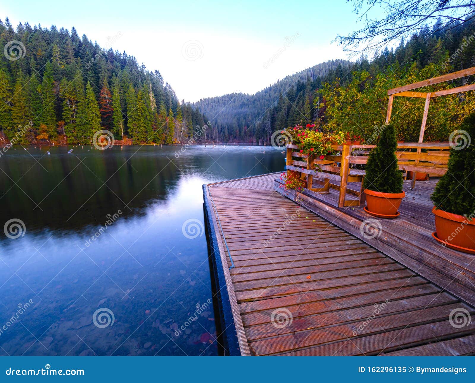 morning on the pontoon from on lacul rosu or red lake located in harghita county, romania, europe