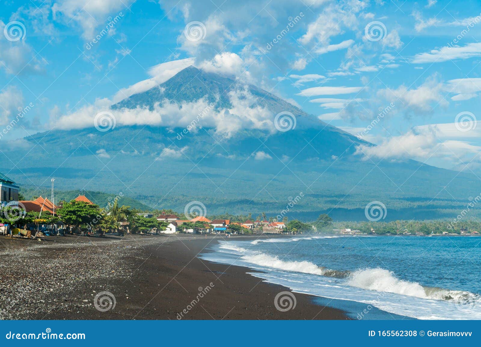 morning sunny view on agung volcano from the coast in amed, bali,  indonesia