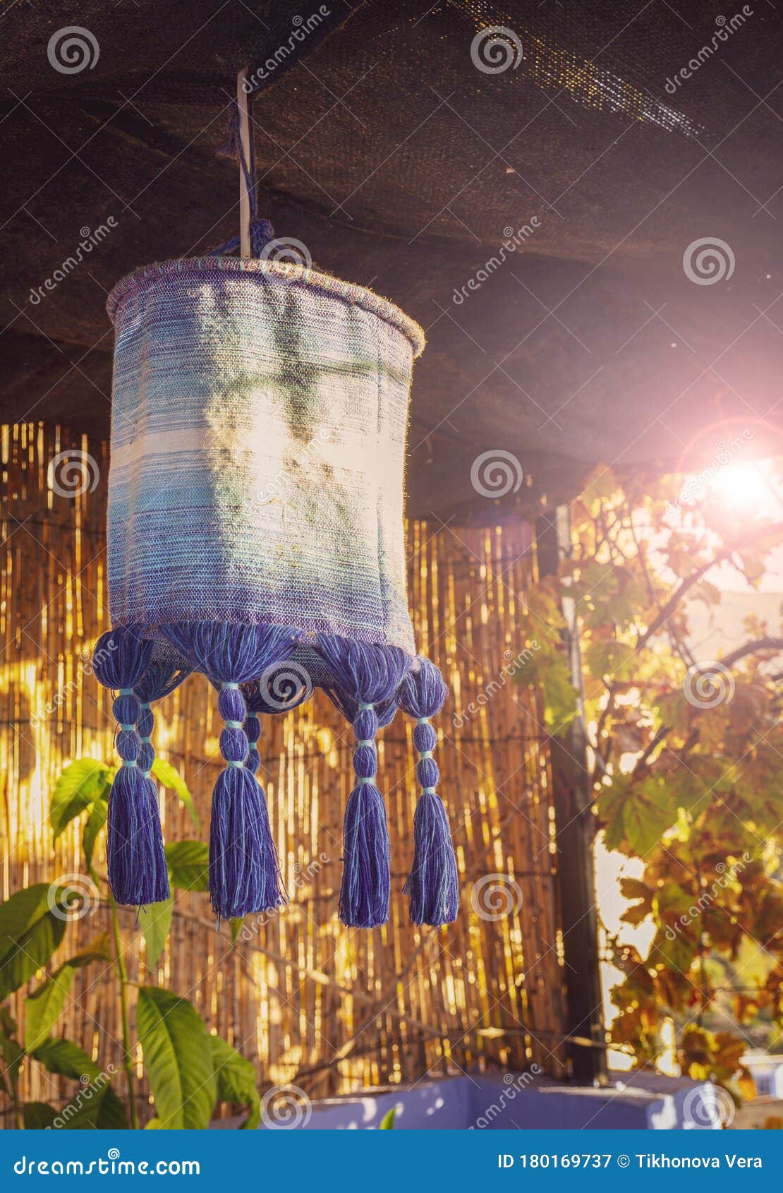 Moroccan Lampshade on the Evening Outdoor Terrace Stock Image - Image