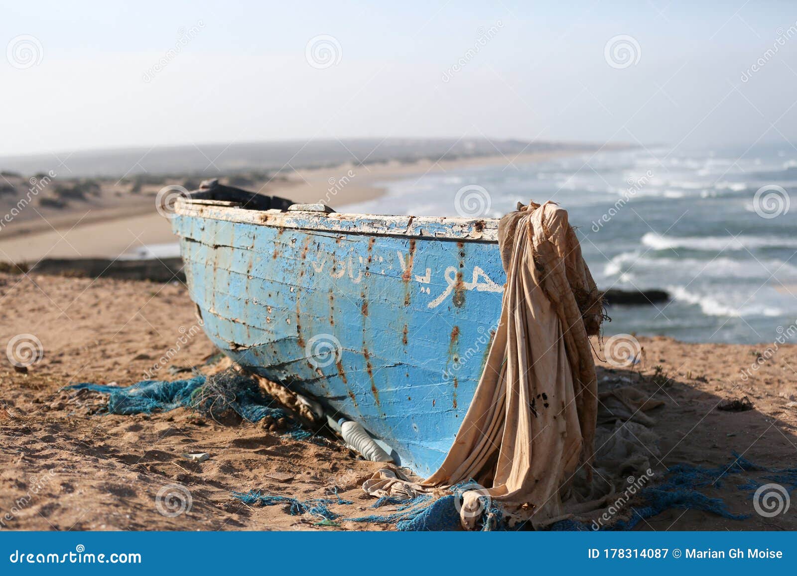 morroco fisherman old boat on the sandy beach