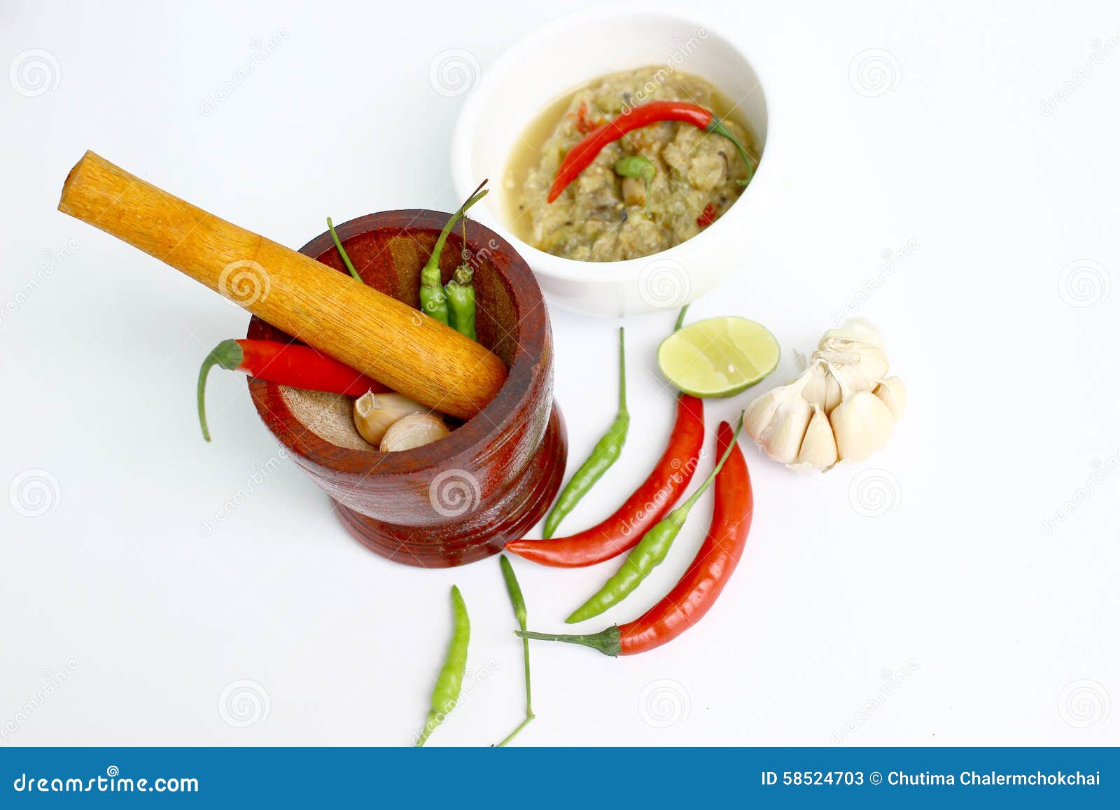 Mortar and Ingredients for Cooking on White Background Stock Image