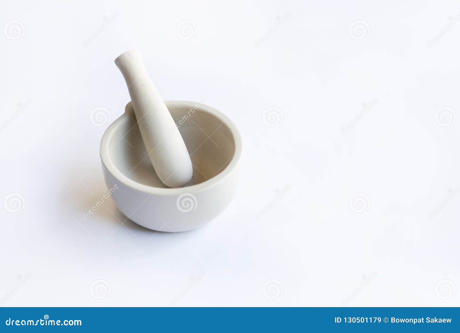 Mortar and pestle on white stock image. Image of tablets 130501179