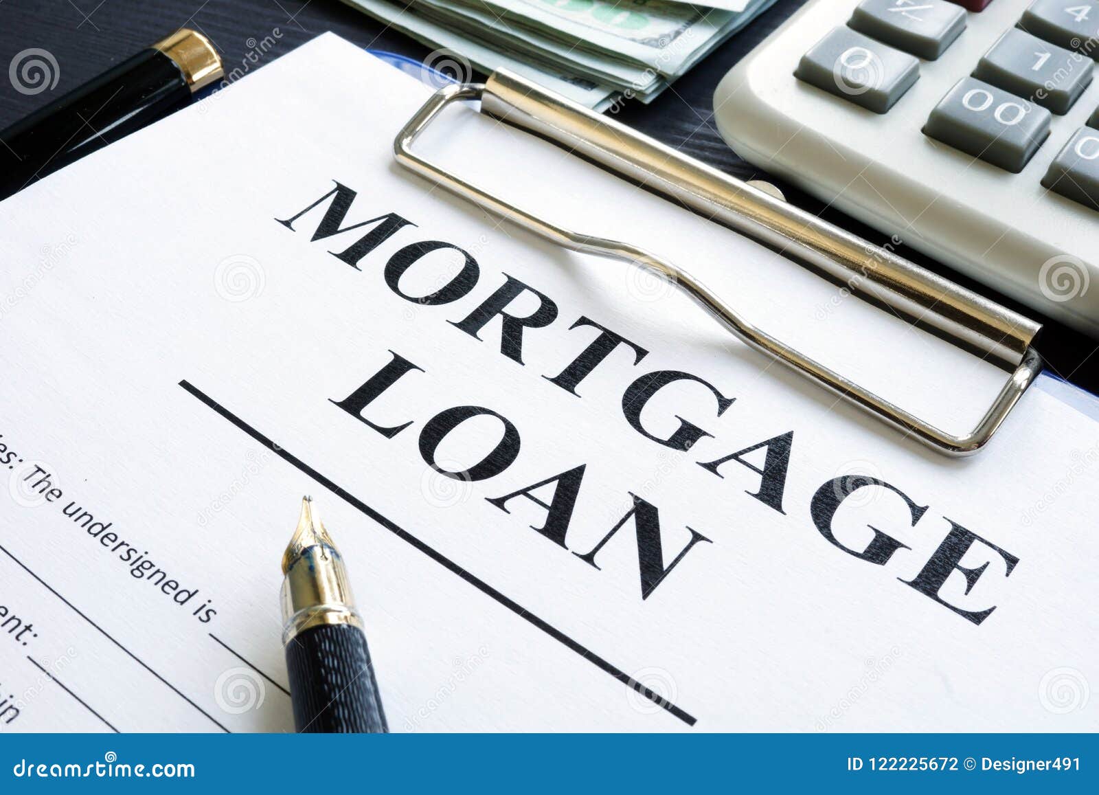 mortgage loan money and calculator stock photo image of loan calculator mortage