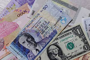 One US Dollar With Different Mauritian Rupee Banknotes Stock Photo 
