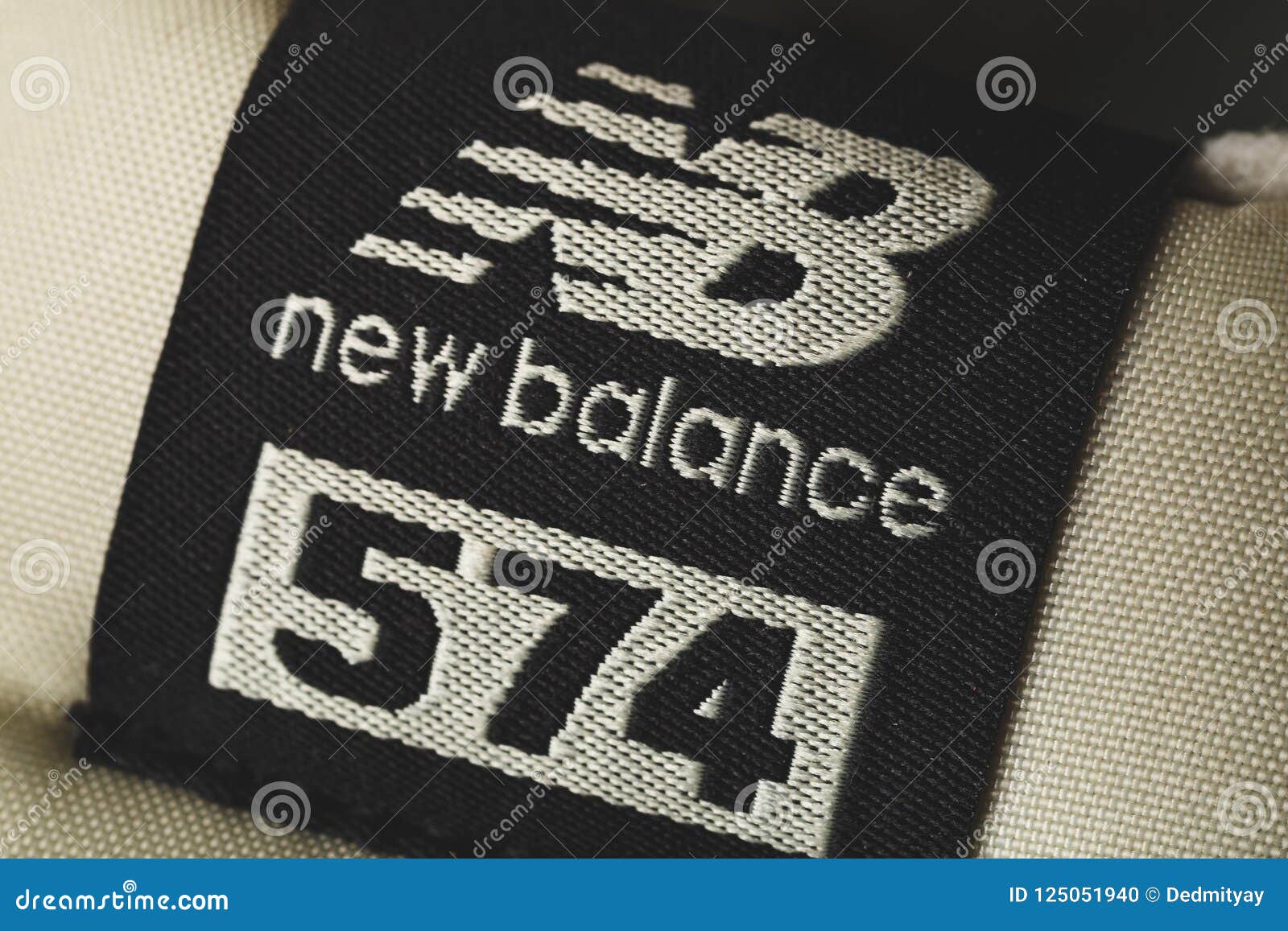 new balance 574 woven logo