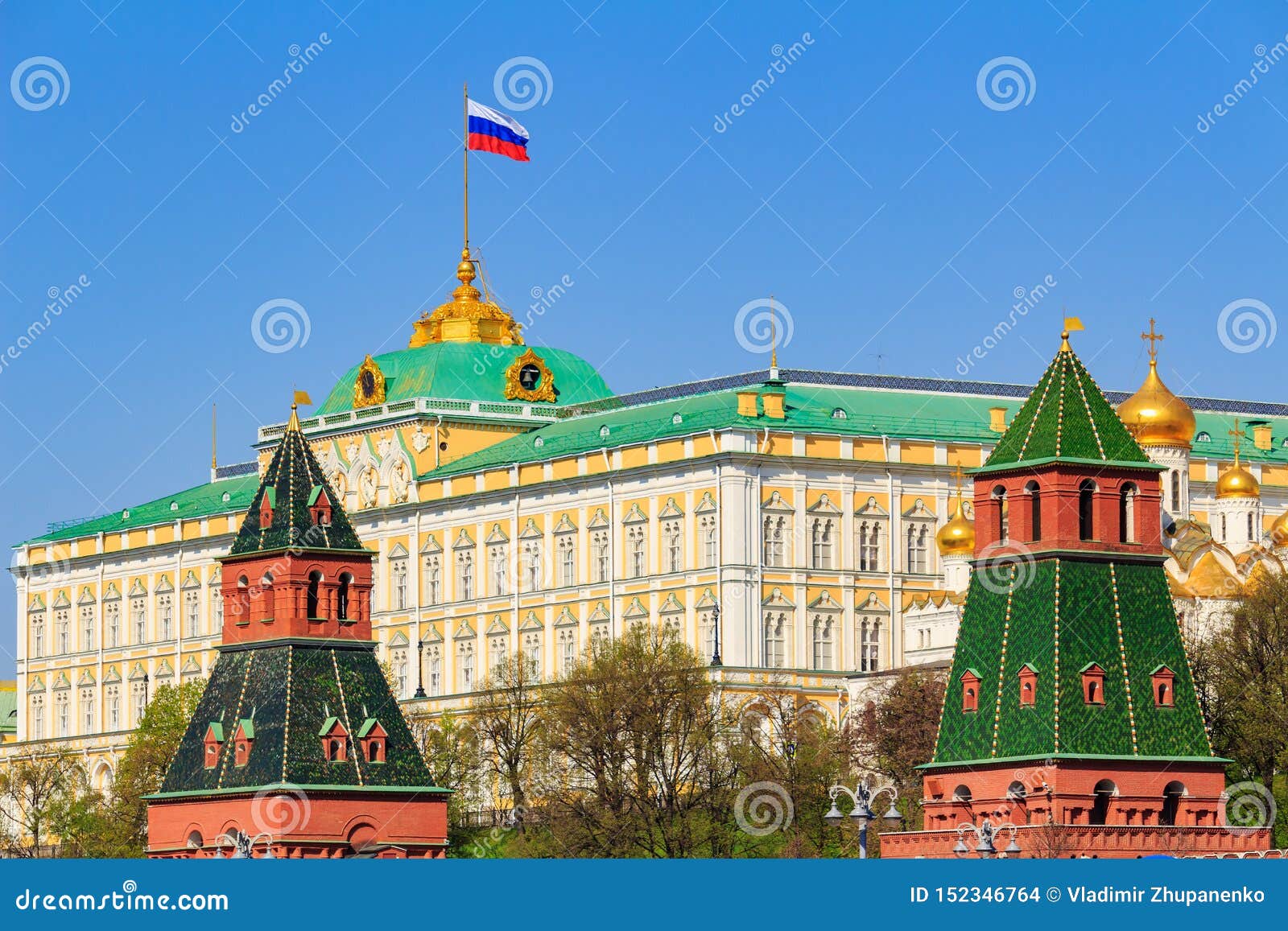 moscow, russia - may 01, 2019: building of grand kremlin palace with waving flag of russian federation on the roof against moscow