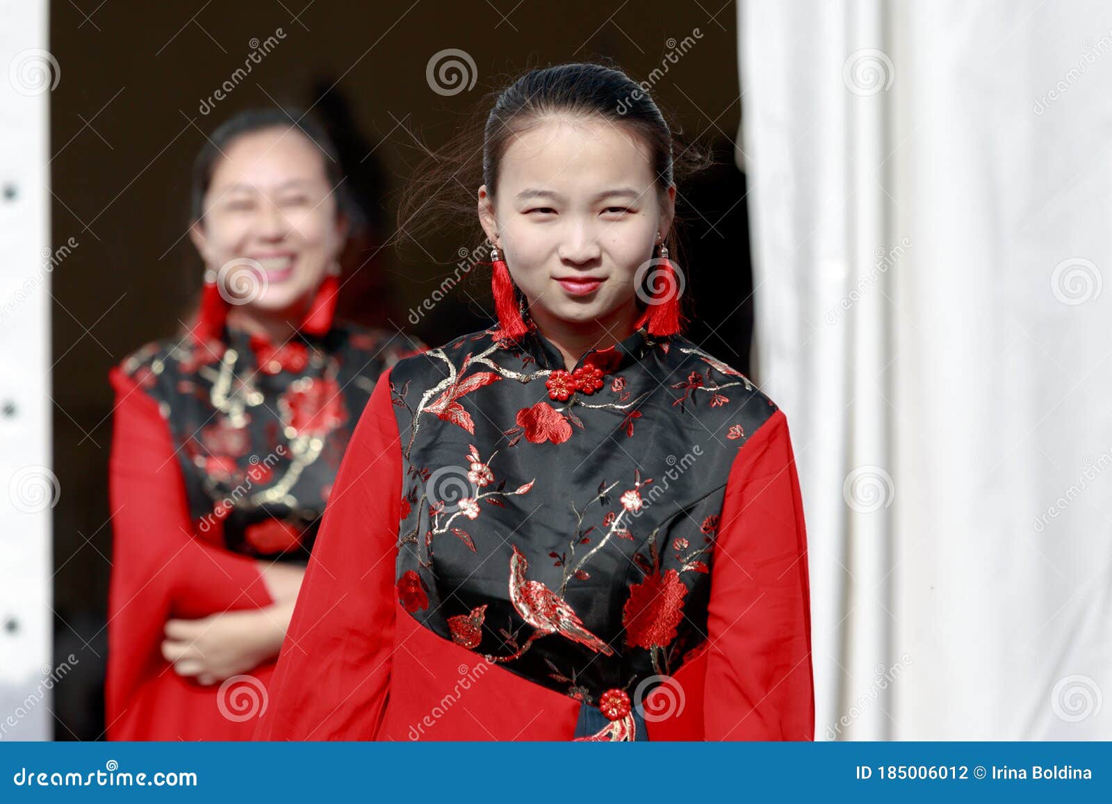 Chinese Girl with Long Earrings in Red National Dress Editorial ...