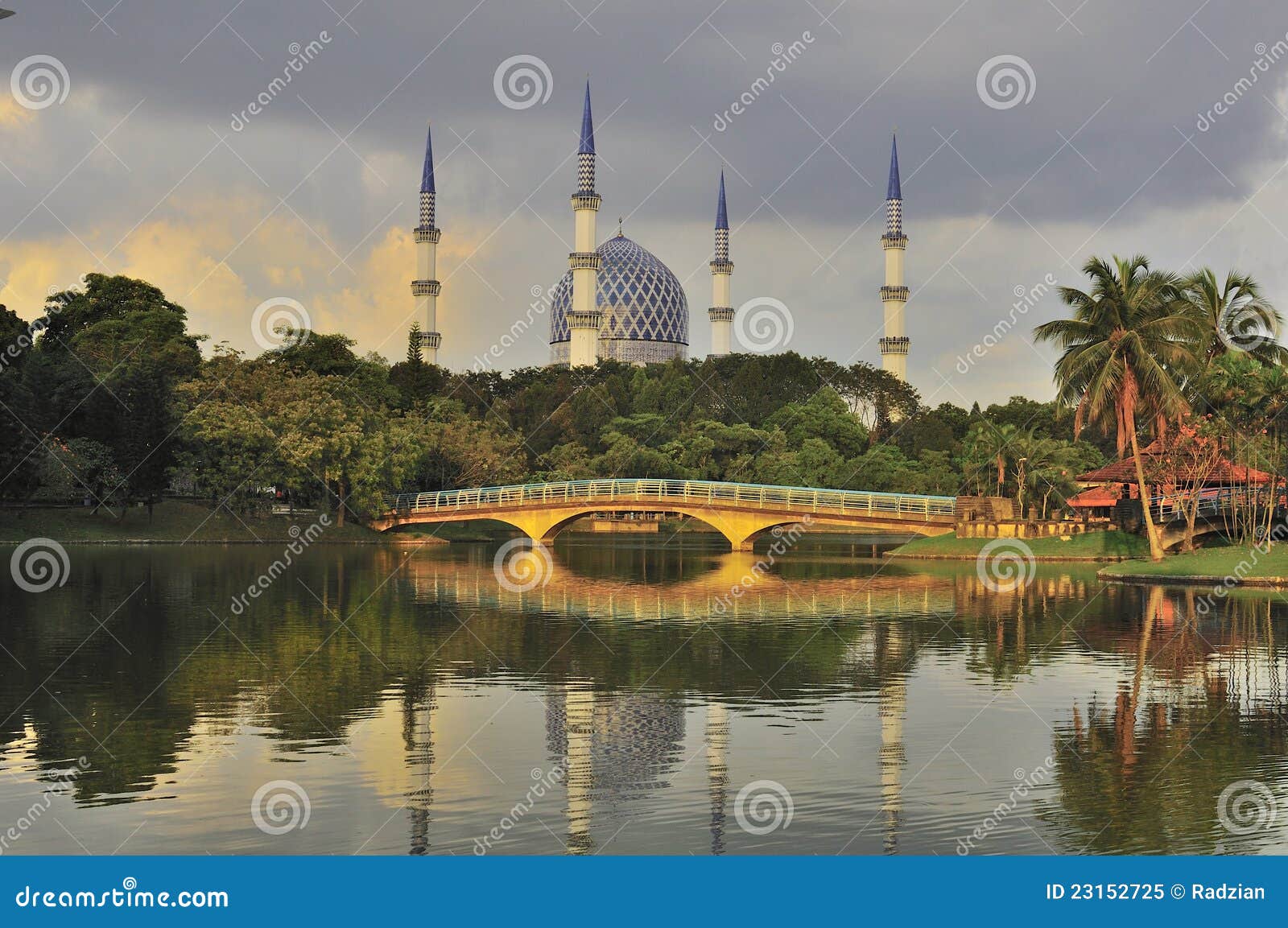 mosque minaret and dome with reflection