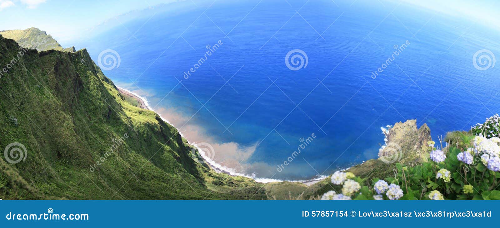 mossy cliff on corvo island and the atlantic ocean