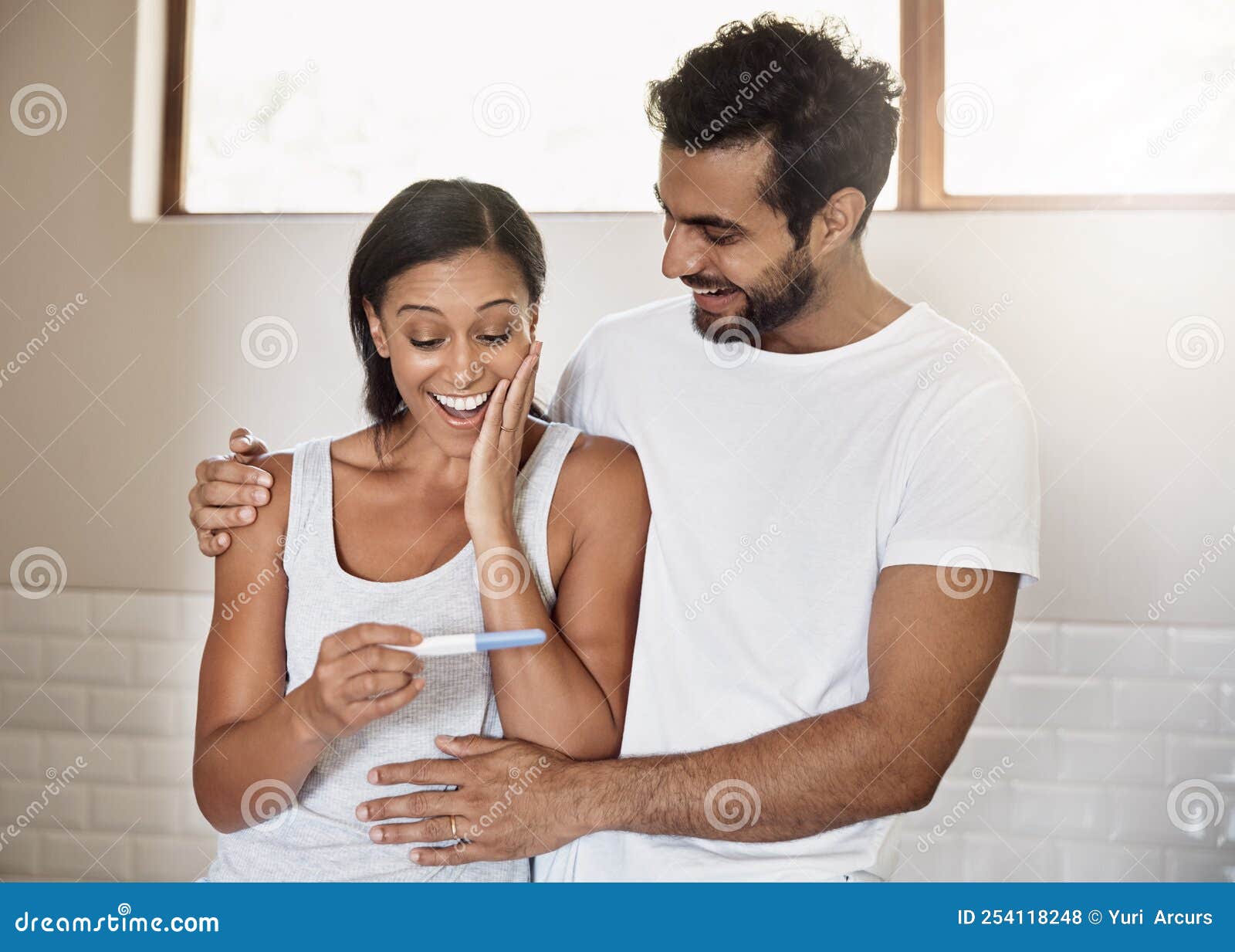 This is the Most Exciting News Ever. a Young Couple Feeling Happy after