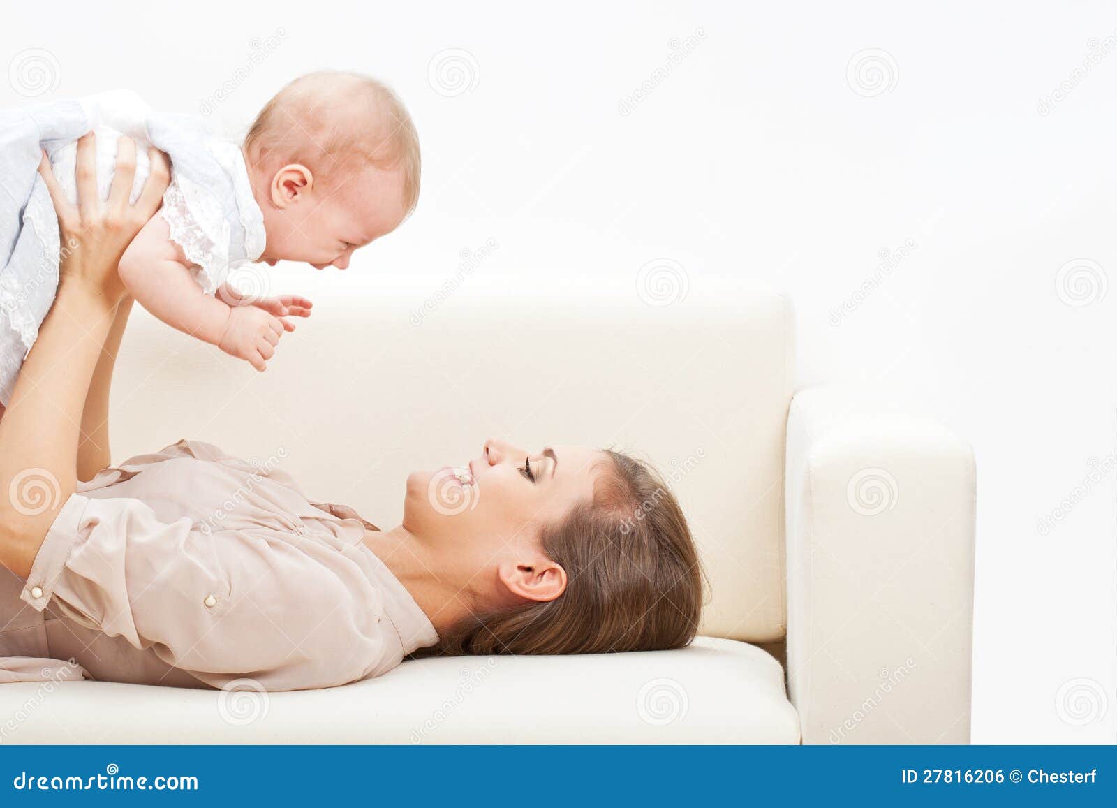 Baby Laying On His Stomach With Angel Wings Attached RoyaltyFree Stock