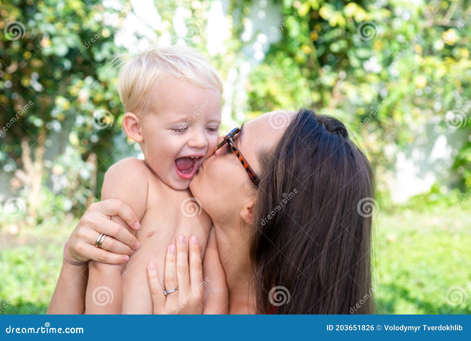 Mother and Baby in Summer. Happy Mothers Day. Mom Hug Son. Family ...