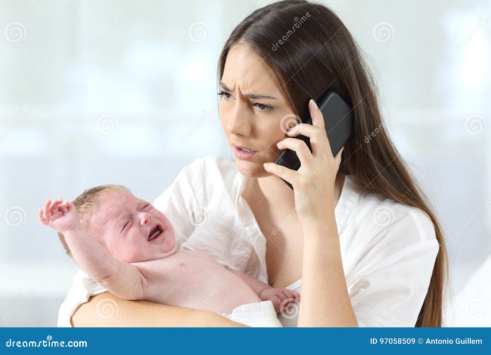 mother calling to a doctor worried about her baby crying