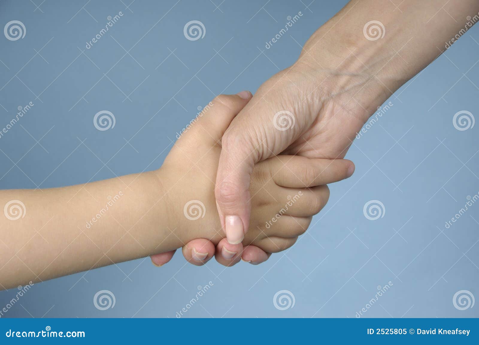 Mother and Child Handshake stock image. Image of wrist 2525805