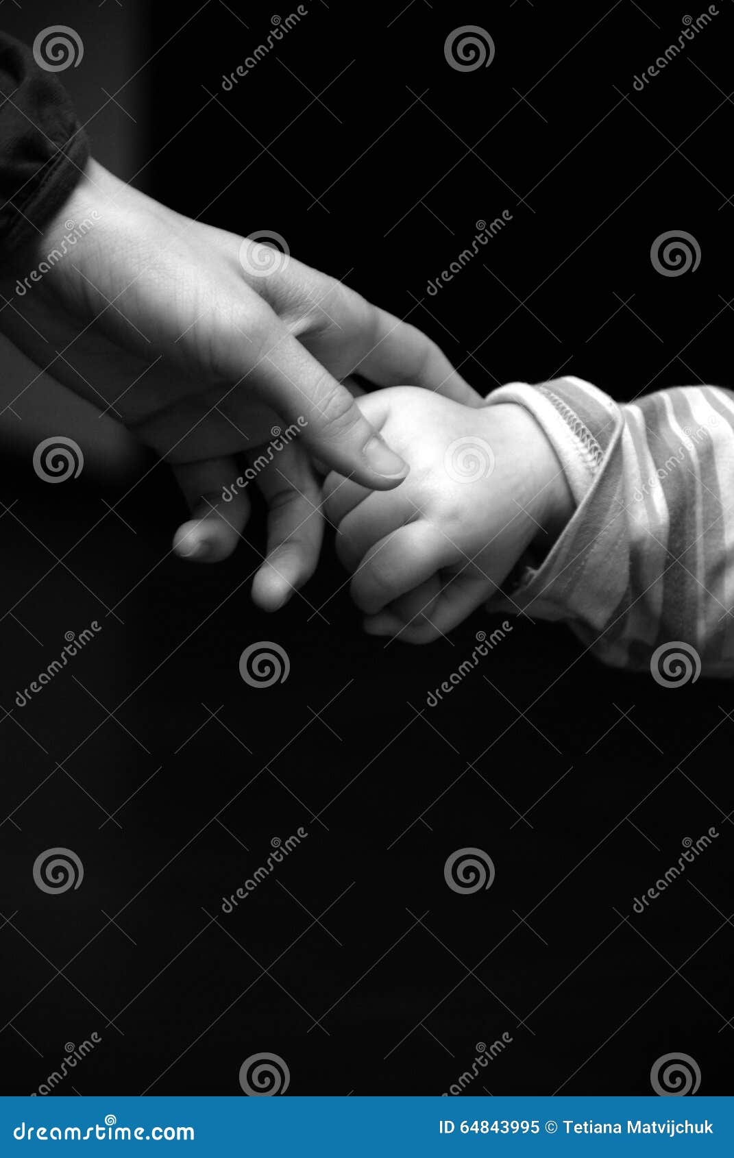 black and white kids holding hands